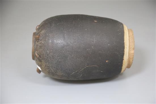 A Chinese Henan dark brown glazed jar, Song-Yuan dynasty, H. 23cm